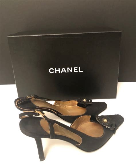 chanel camellia black shoes.